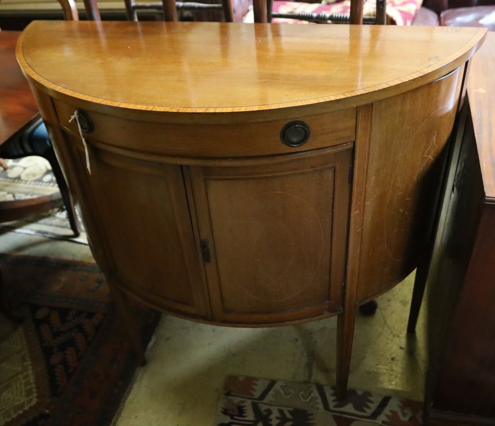 A Sheraton revival mahogany demi lune cabinet, width 95cm, depth 42cm, height 94cm